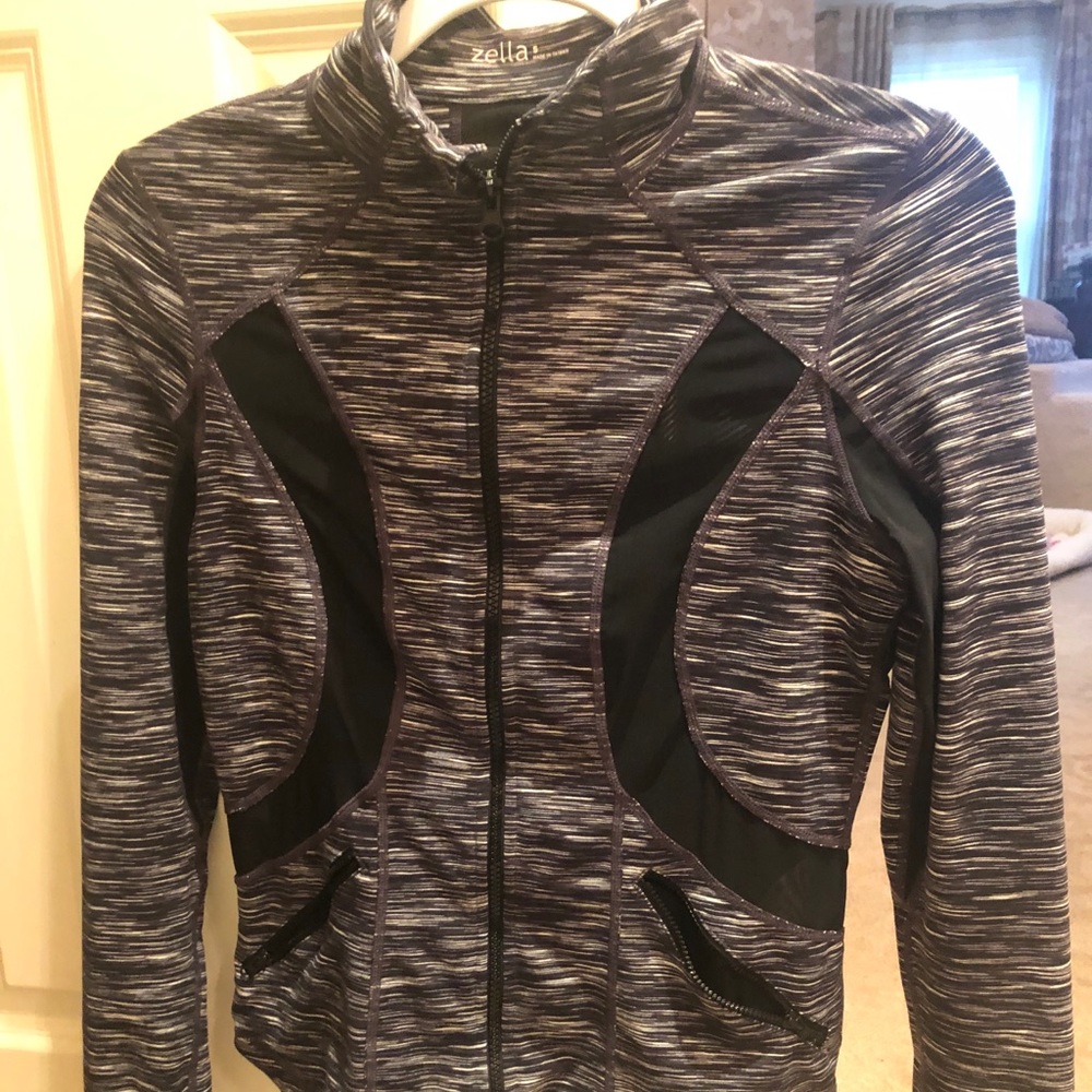 Zella. Black/white jacket. Mesh Panels in back.